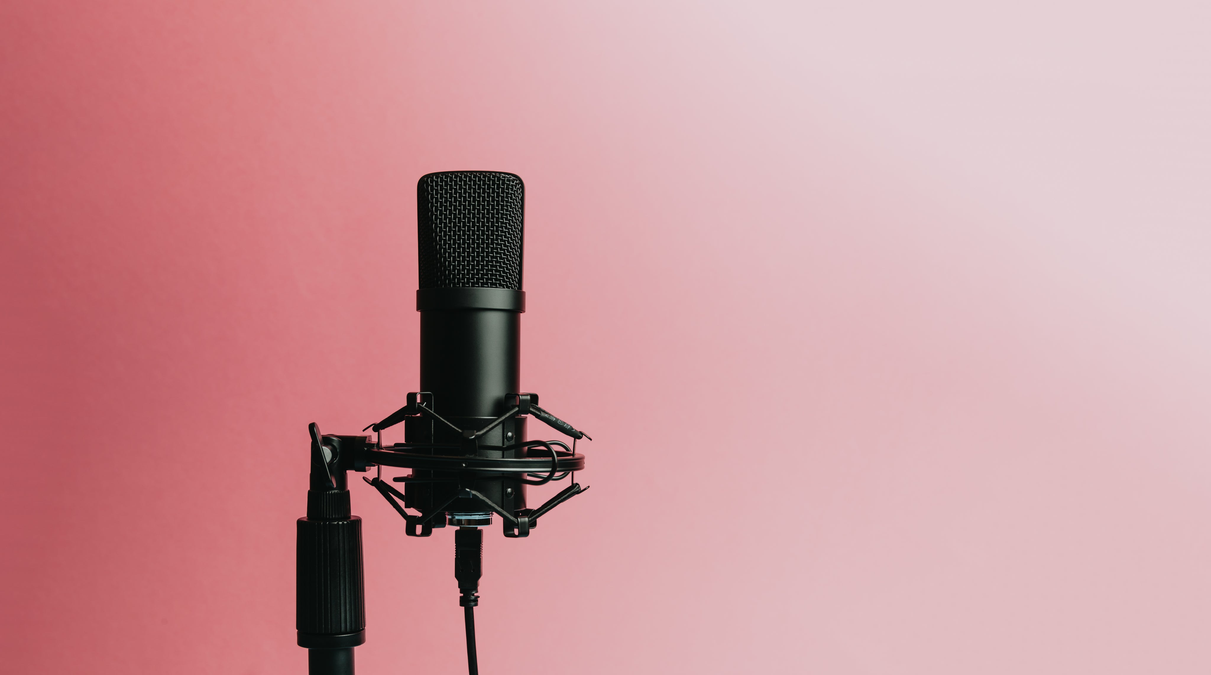 black microphone audio podcast service