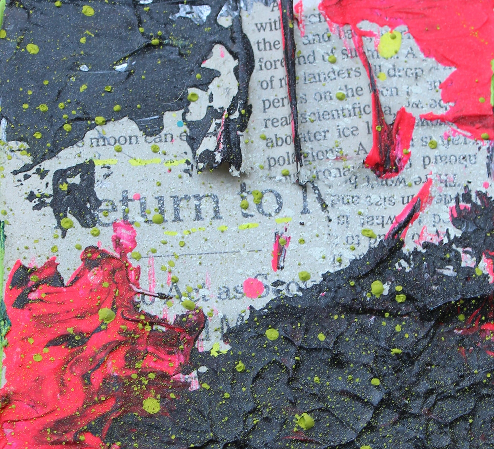 Small square piece of art with red, black, and gray colors on a textured surface