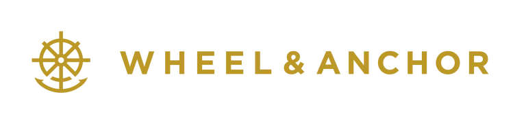 Logo of Wheel & Anchor with a wheel and anchor symbol on a white background